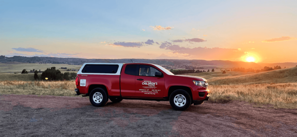 Red truck at sunset